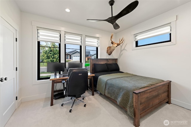 2140 Lagerwey Cir, Lynden, WA 98264 - bedroom with multiple windows, an office area, light carpet, and a ceiling fan