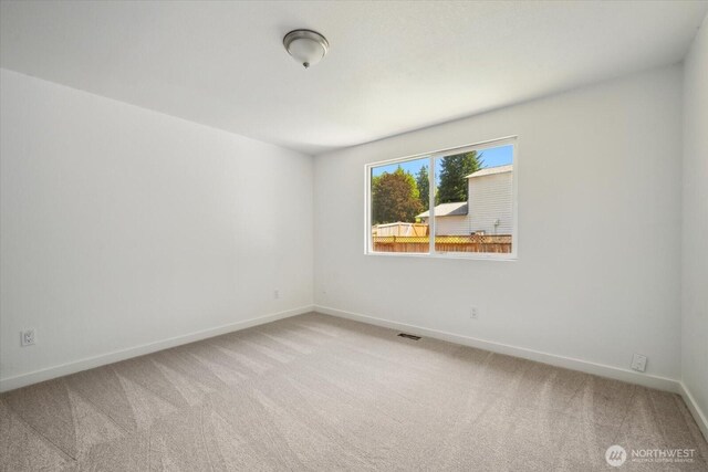 16931 20th Dr SE, Bothell, WA 98012 - empty room featuring light carpet and baseboards