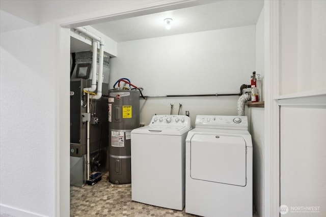 16931 20th Dr SE, Bothell, WA 98012 - laundry area with washing machine and dryer, electric water heater, and heating unit