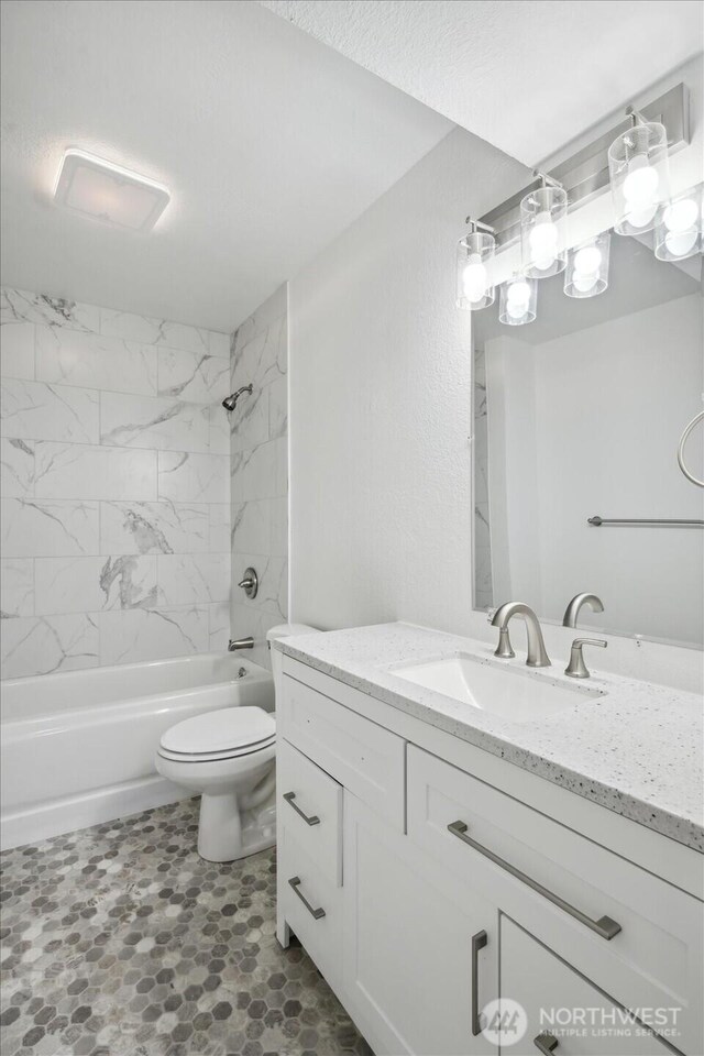 16931 20th Dr SE, Bothell, WA 98012 - full bath featuring vanity, tub / shower combination, and toilet
