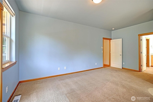 26306 2nd Ave NE, Arlington, WA 98223 - unfurnished bedroom with carpet flooring and baseboards