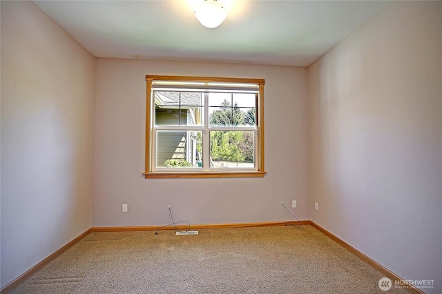 26306 2nd Ave NE, Arlington, WA 98223 - carpeted spare room featuring baseboards