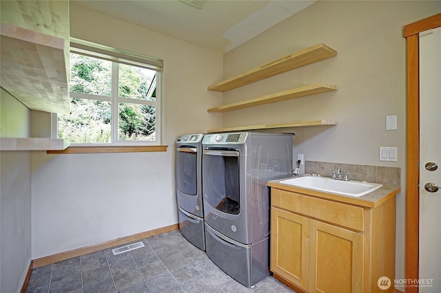 26306 2nd Ave NE, Arlington, WA 98223 - laundry area featuring washer and clothes dryer and cabinet space