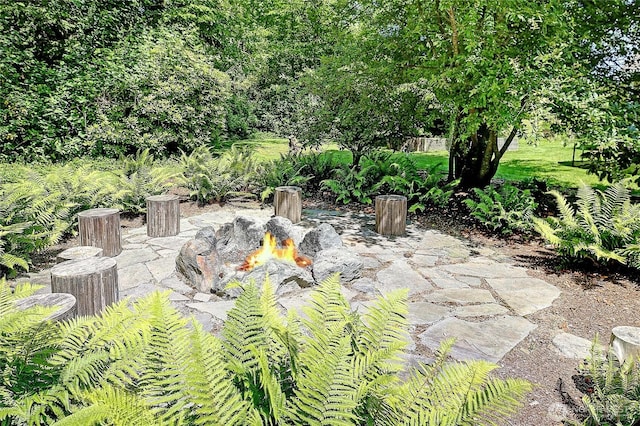 26306 2nd Ave NE, Arlington, WA 98223 - view of patio featuring an outdoor fire pit
