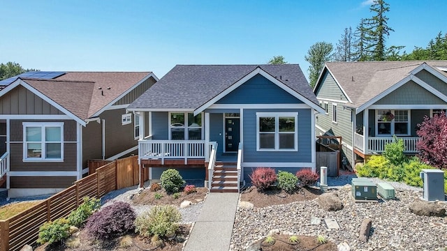 711 Blackstone Ln, Bellingham, WA 98226 - view of front of home featuring covered porch, stairs, a shingled roof, and board and batten siding