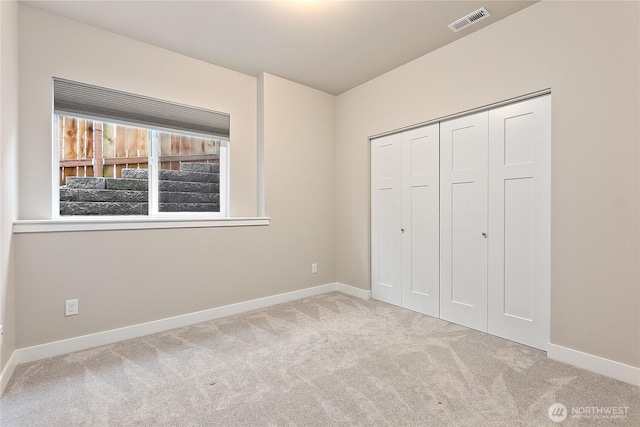 711 Blackstone Ln, Bellingham, WA 98226 - unfurnished bedroom featuring carpet floors, baseboards, and a closet