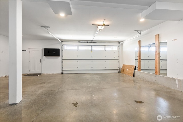 711 Blackstone Ln, Bellingham, WA 98226 - garage featuring a garage door opener