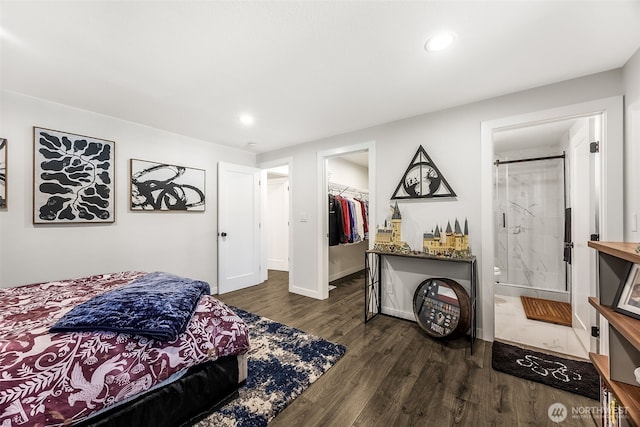 24028 6th Pl W, Bothell, WA 98021 - bedroom featuring dark wood finished floors, a walk in closet, recessed lighting, a closet, and baseboards