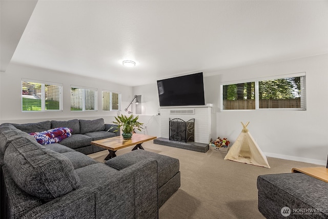 24028 6th Pl W, Bothell, WA 98021 - carpeted living room with a fireplace and baseboards