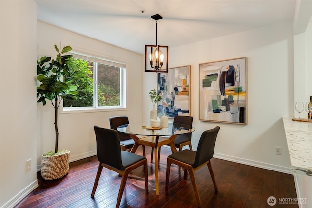 14251 73rd Ave NE Unit A101, Kirkland, WA 98034 - dining room featuring a chandelier and dark wood-style flooring