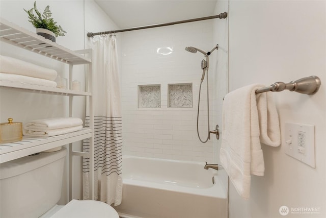 14251 73rd Ave NE Unit A101, Kirkland, WA 98034 - bathroom with shower / tub combo with curtain and toilet