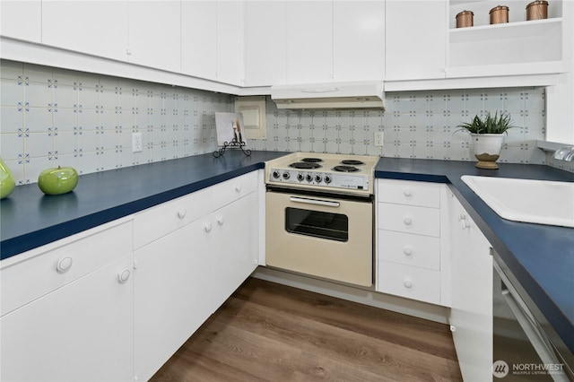 505 Belmont Ave E Unit 704, Seattle, WA 98102 - kitchen featuring white range with electric stovetop, extractor fan, dishwasher, white cabinets, and dark countertops
