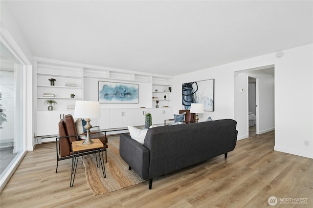 505 Belmont Ave E Unit 704, Seattle, WA 98102 - living area with light wood finished floors and a baseboard radiator
