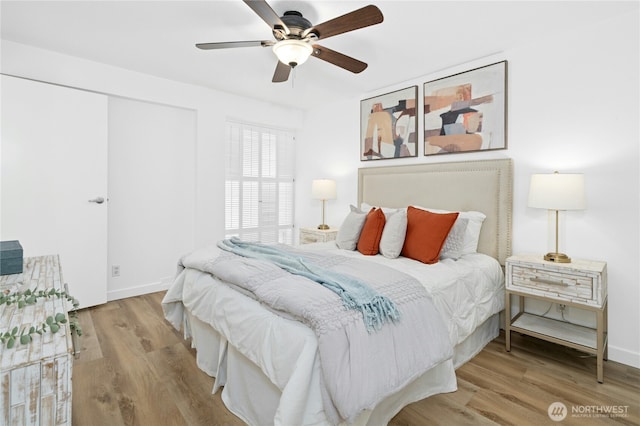505 Belmont Ave E Unit 704, Seattle, WA 98102 - bedroom featuring wood finished floors and ceiling fan
