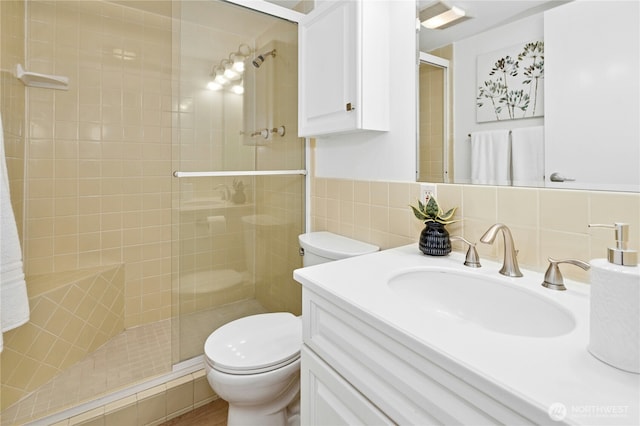 505 Belmont Ave E Unit 704, Seattle, WA 98102 - bathroom with a shower stall, vanity, and tile walls