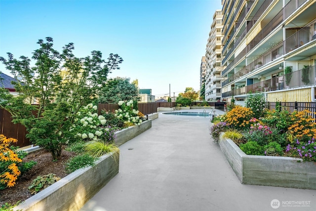 505 Belmont Ave E Unit 704, Seattle, WA 98102 - view of property's community with a swimming pool and a patio