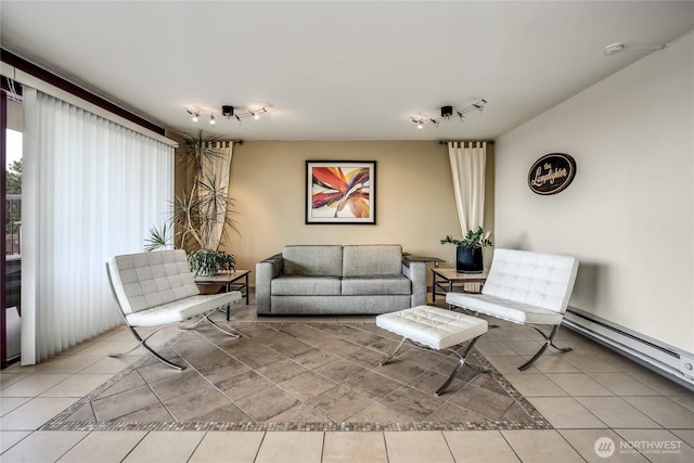 505 Belmont Ave E Unit 704, Seattle, WA 98102 - living area featuring track lighting, tile patterned flooring, and baseboard heating