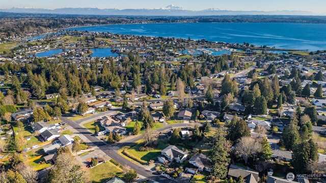 8148 Quinault Rd, Blaine, WA 98230 - aerial view of property and surrounding area featuring a large body of water and nearby suburban area