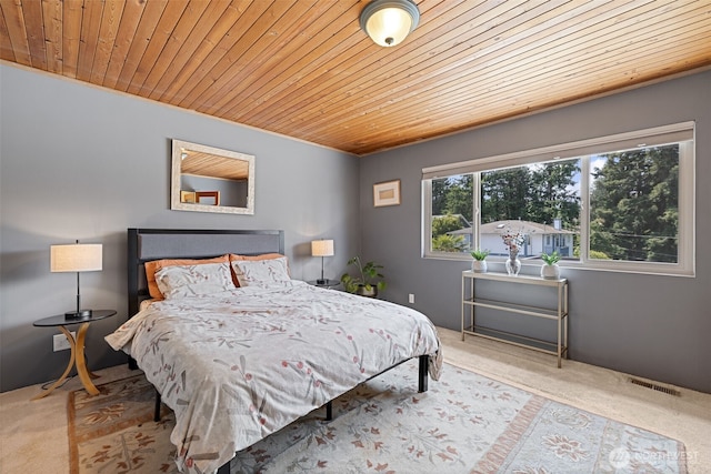 8814 Earl Ave NW, Seattle, WA 98117 - carpeted bedroom with wooden ceiling