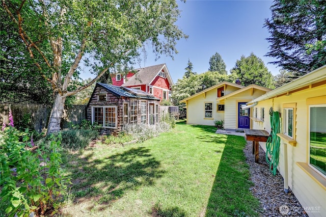 715 Grant St, Port Townsend, WA 98368 - view of yard with an outbuilding and a greenhouse