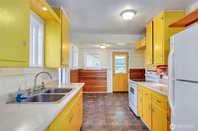 715 Grant St, Port Townsend, WA 98368 - kitchen featuring white appliances, light countertops, and yellow cabinetry