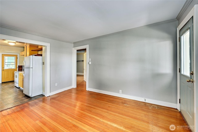 715 Grant St, Port Townsend, WA 98368 - unfurnished living room with ornamental molding and wood finished floors