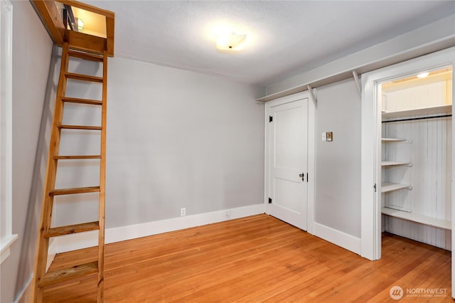 715 Grant St, Port Townsend, WA 98368 - unfurnished bedroom featuring light wood-type flooring and a closet