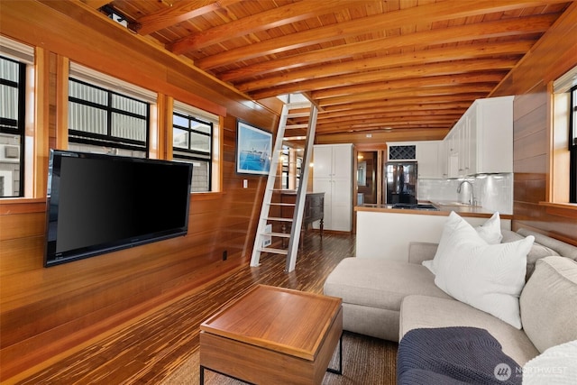 360 W Ewing St Unit D3, Seattle, WA 98119 - living area with wooden ceiling with exposed beams, wood finished floors, and wooden walls
