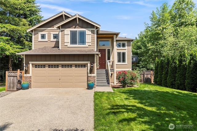 8305 172nd Pl NE, Arlington, WA 98223 - view of front facade with board and batten siding, roof with shingles, an attached garage, asphalt driveway, and stone siding
