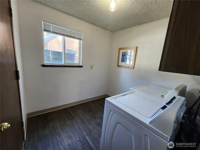 4608 73rd Street Ct E, Tacoma, WA 98443 - laundry area featuring washer and dryer, a textured ceiling, cabinet space, dark wood-style flooring, and baseboards