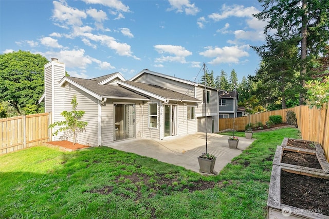 17913 158th Pl SE, Renton, WA 98058 - rear view of house with a garden, a patio area, and a chimney