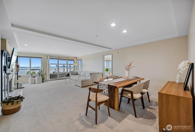 601 W Mercer Pl Unit 201, Seattle, WA 98119 - dining space with light carpet and recessed lighting