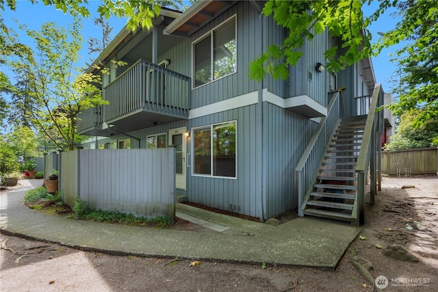 7520 208th St SW Unit A104, Edmonds, WA 98026 - view of side of home with a balcony and stairs