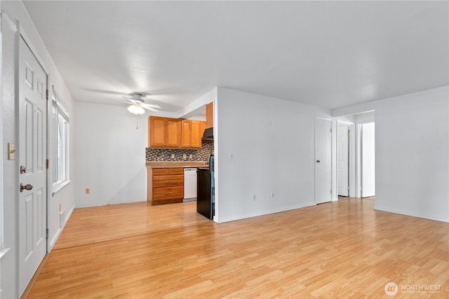 7520 208th St SW Unit A104, Edmonds, WA 98026 - unfurnished living room with light wood-type flooring and ceiling fan