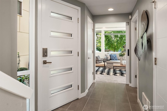 2012 14th Ave S, Seattle, WA 98144 - entryway featuring dark tile patterned flooring, recessed lighting, and baseboards