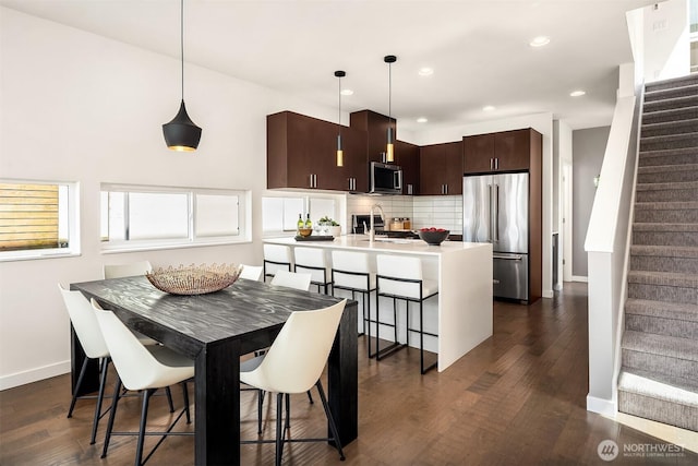 2012 14th Ave S, Seattle, WA 98144 - dining space with stairs, baseboards, dark wood-style floors, and recessed lighting