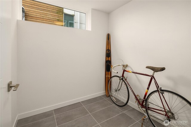 2012 14th Ave S, Seattle, WA 98144 - misc room featuring dark tile patterned floors and baseboards