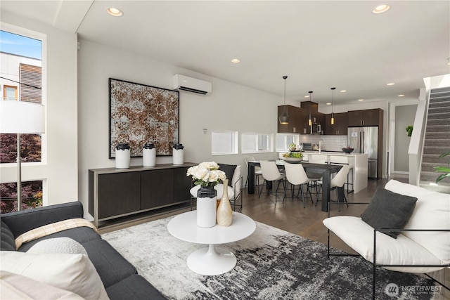 2012 14th Ave S, Seattle, WA 98144 - living area featuring a wall mounted air conditioner, dark wood finished floors, and recessed lighting