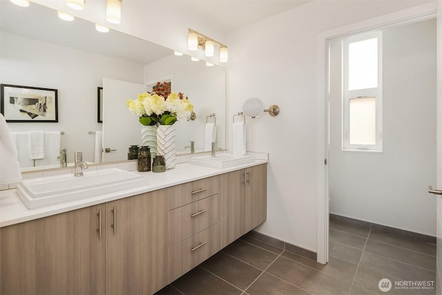 2012 14th Ave S, Seattle, WA 98144 - bathroom with double vanity, healthy amount of natural light, and tile patterned flooring