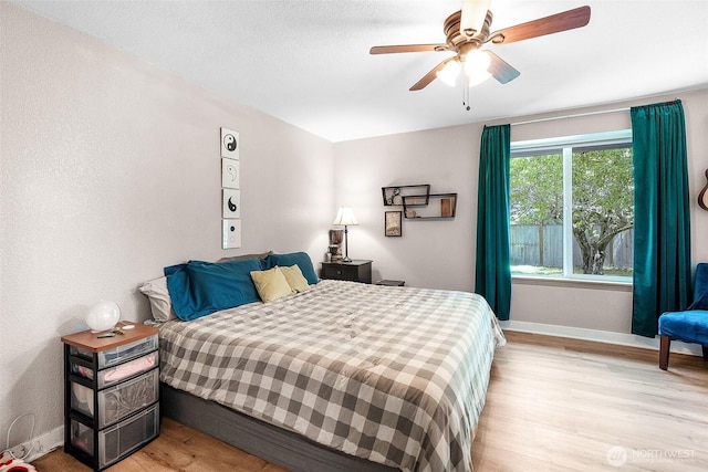 1226 Juniper Dr SE, Olympia, WA 98513 - bedroom with wood finished floors and a ceiling fan