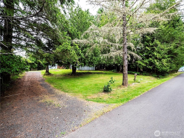 9712 Channel Dr NW, Olympia, WA 98502 - view of front of house featuring a front yard and driveway