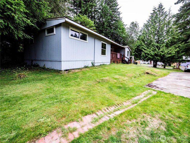 9712 Channel Dr NW, Olympia, WA 98502 - view of grassy yard