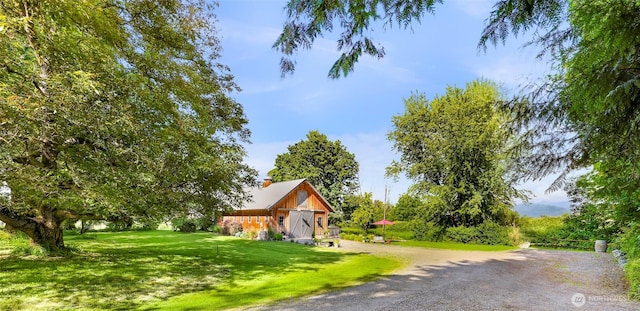 329 Columbia St, Sumas, WA 98295 - view of front facade with a front lawn and an outdoor structure