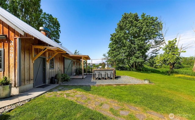 329 Columbia St, Sumas, WA 98295 - view of green lawn featuring a patio area