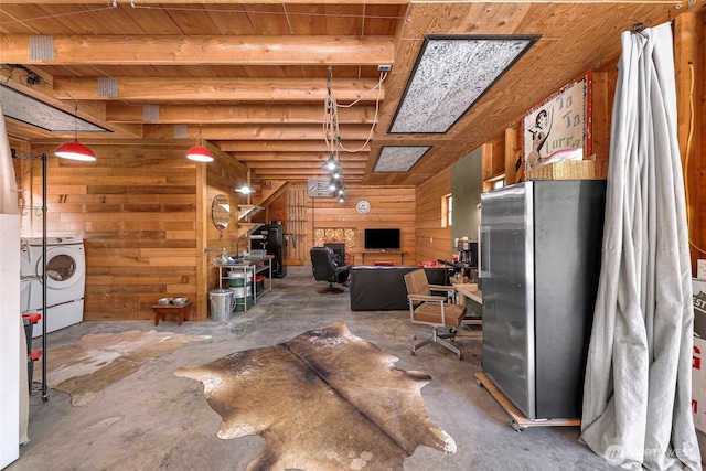 329 Columbia St, Sumas, WA 98295 - misc room with concrete flooring, wooden walls, washing machine and dryer, and wood ceiling