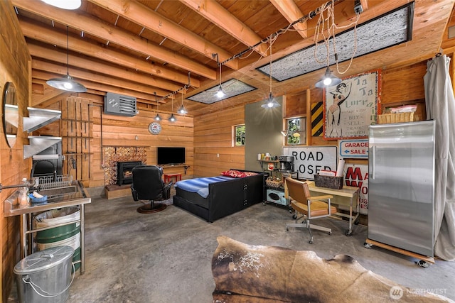 329 Columbia St, Sumas, WA 98295 - office space featuring concrete flooring, wooden walls, and wooden ceiling with exposed beams