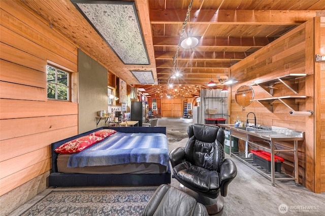 329 Columbia St, Sumas, WA 98295 - interior space featuring wooden walls, concrete flooring, and wooden ceiling with exposed beams