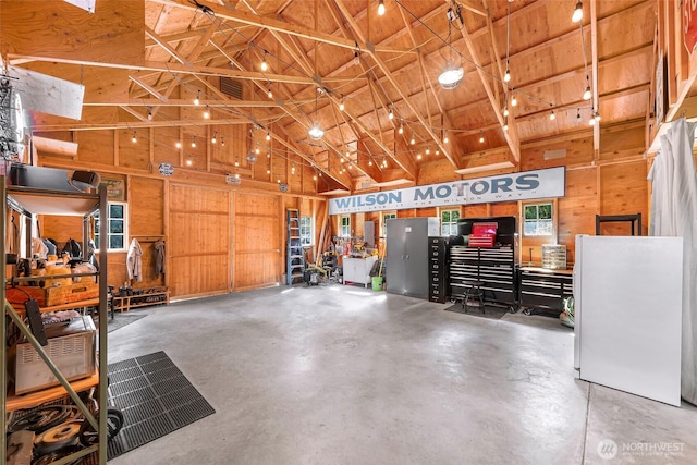329 Columbia St, Sumas, WA 98295 - garage with wooden walls and wooden ceiling