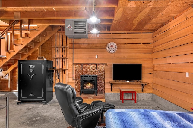 329 Columbia St, Sumas, WA 98295 - living room featuring wood ceiling, wooden walls, a wood stove, and stairs