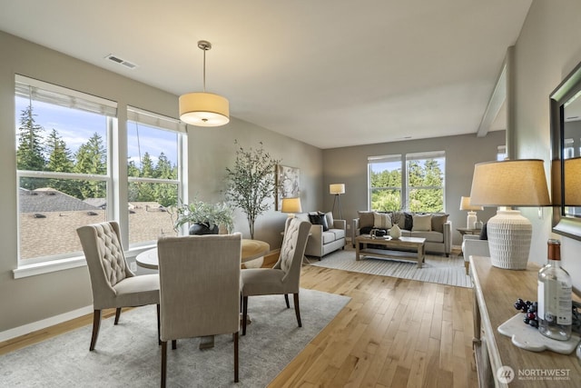 26216 SE 228th Ave SE Unit 26216, Maple Valley, WA 98038 - dining space with wood-type flooring and baseboards